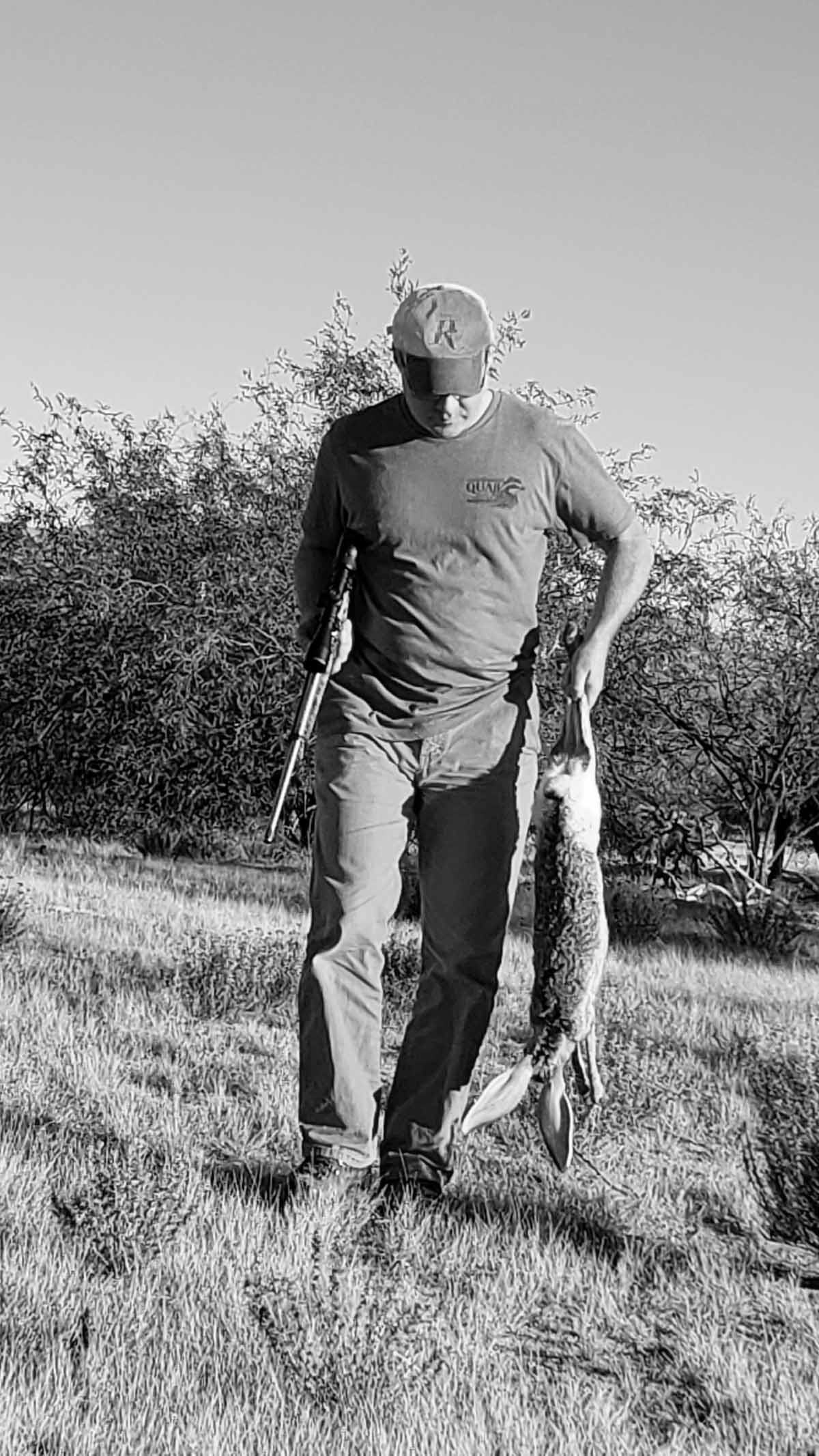 Hank Shaw carrying an antelope jackrabbit. 