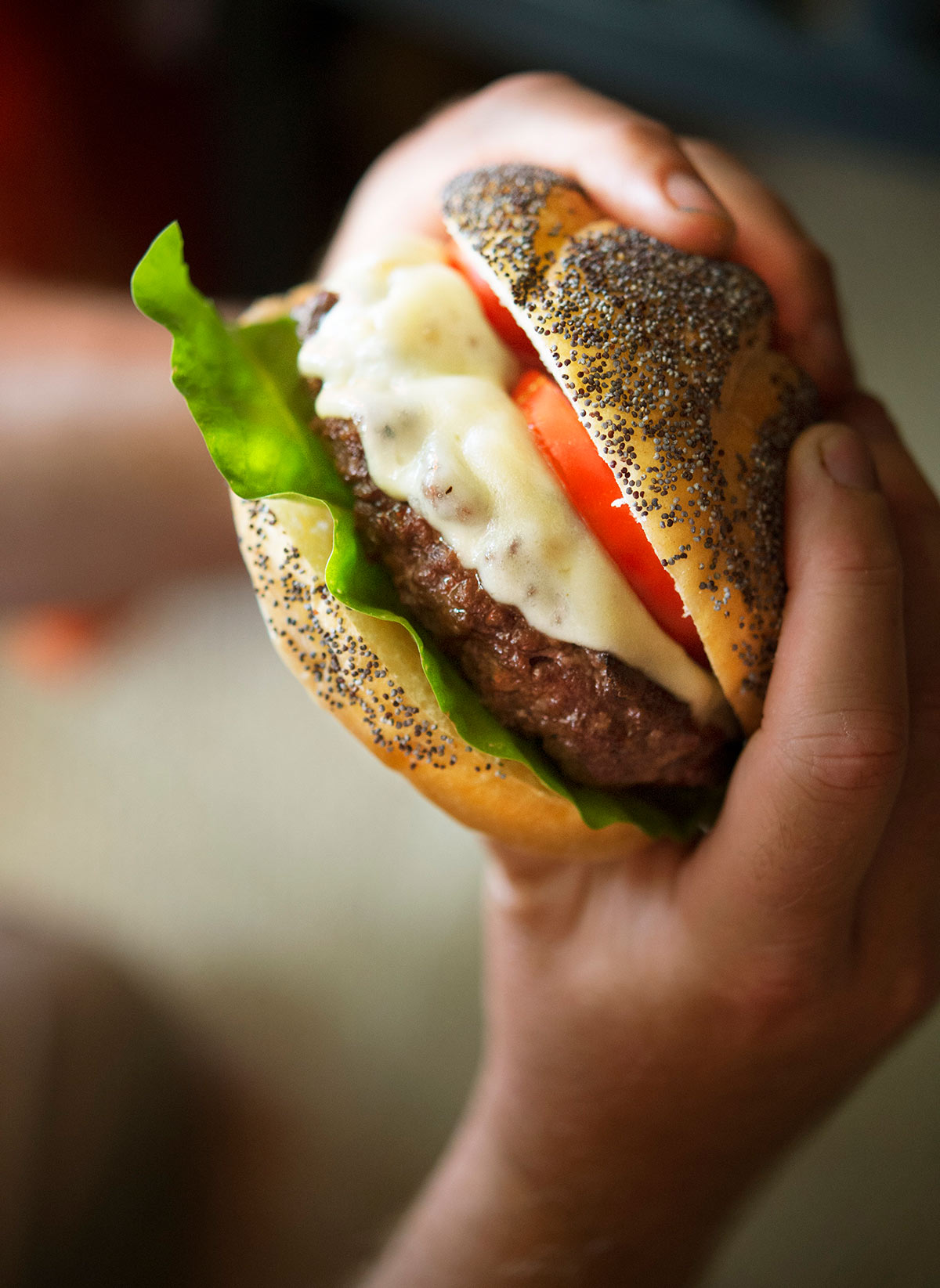 A perfect venison burger, headed to your mouth.