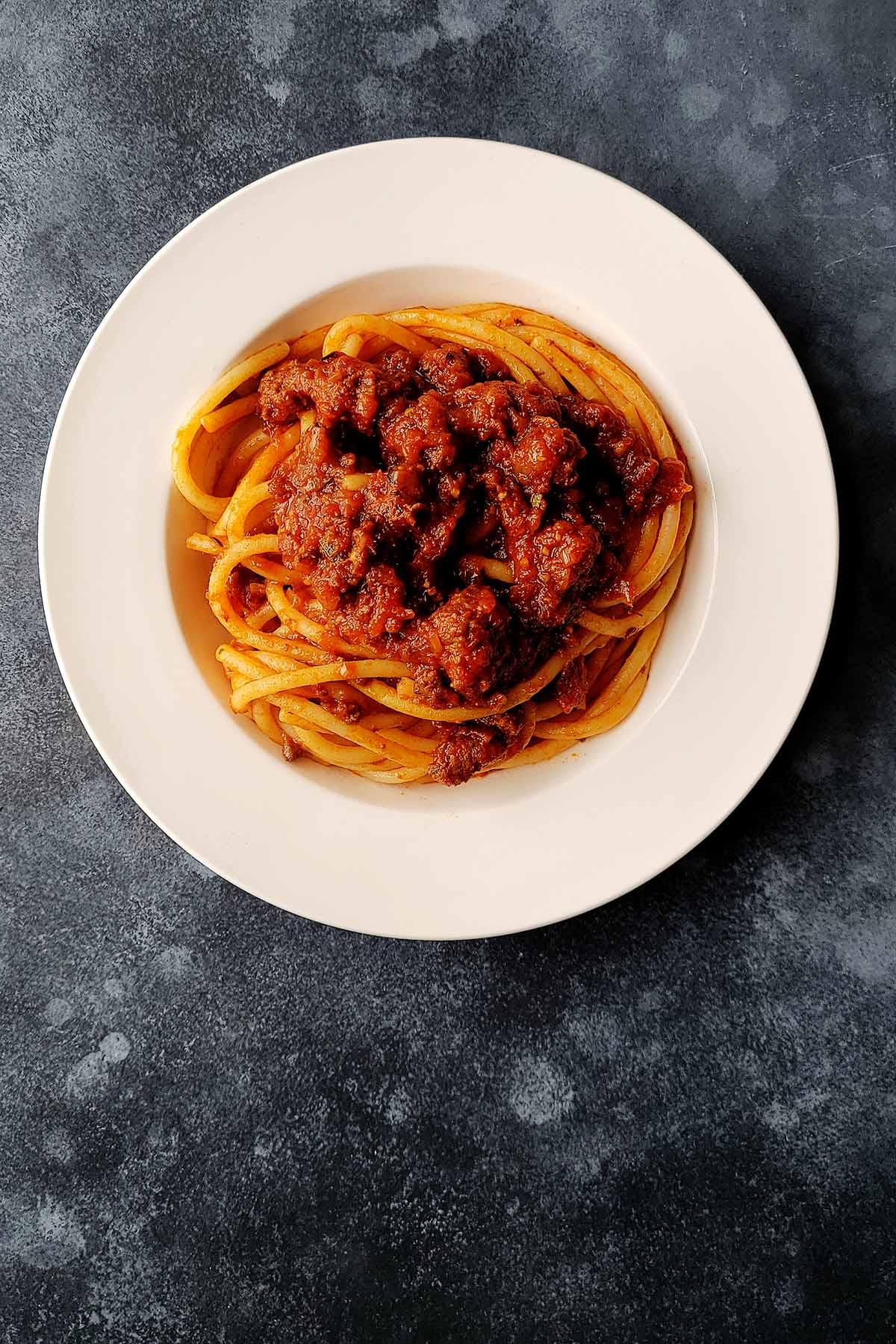 A bowl of Italian American red sauce on pasta.