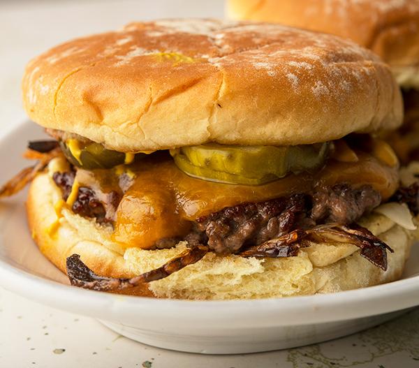 An Oklahoma onion burger on a plate. 