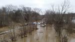 Flood waters surrounding railroad tracks