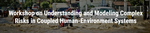 White text with workshop title over image of flooded urban street