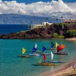 Canoe festival on beach in Maui