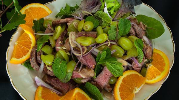 Oriental Beef Salad is a wonderful combination of beef, fruits and Thai spices.