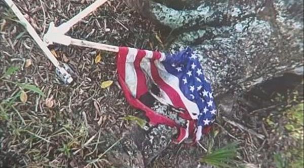 Veteran Graves Vandalized & American Flags Burned At Cemetery