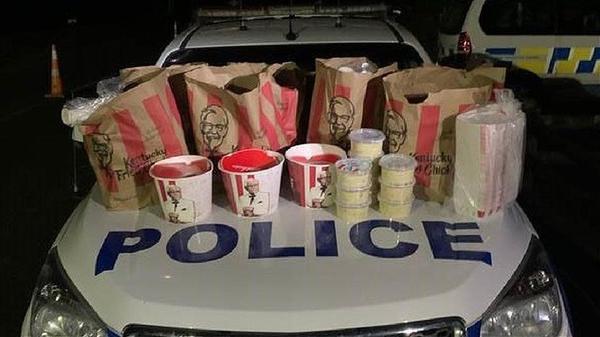Two Men Arrested For Smuggling Buckets Of KFC And All The Fixings
