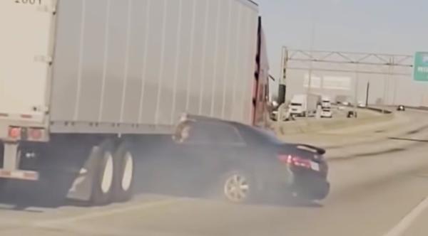 Teen In Car Being Dragged By Semi-Truck Waves For Help