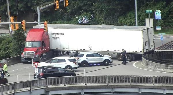 Semi Truck Tries U-Turn And Gets Unbelievably Stuck On Bridge!