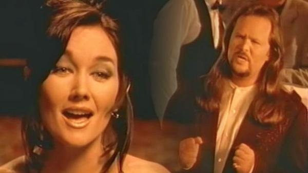 Lari White & Travis Tritt Pine Over Lost Love In Passionate Video For Their Hit Duet