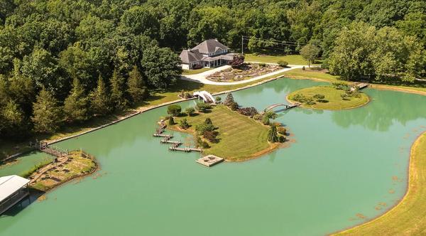 House With “Fully Stoked” Lake For Sale – See The Price