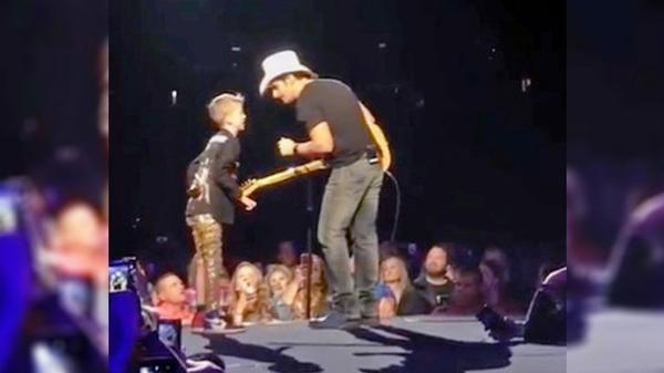 Brad Paisley Hands Mic To 9-Year-Old Boy...And He Steals The Show