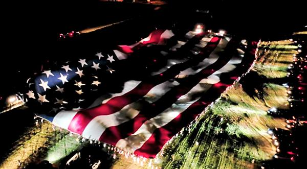 World’s Largest American Flag Unfolded As Trump Flew Across South Dakota