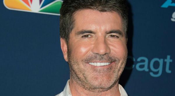 Simon Cowell Suffers Broken Back After Bicycle Accident