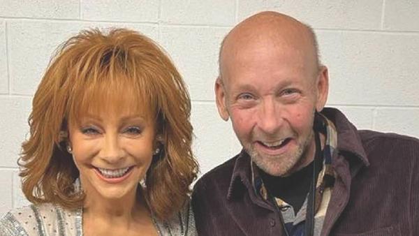 Reba McEntire “Saddened” By Passing Of Touring Partner