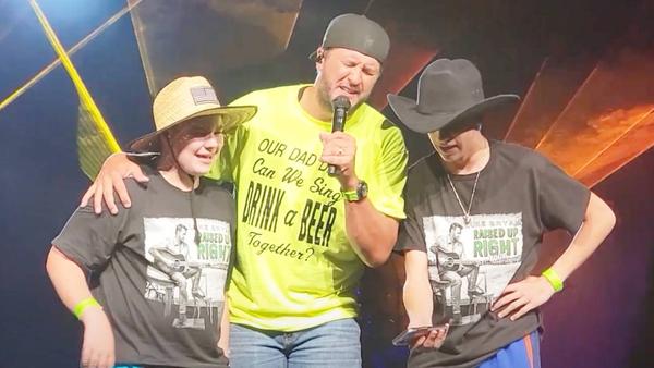 Luke Bryan Sings “Drink A Beer” With 2 Kids Whose Dad Passed Away