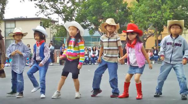 Tiny Cowboys and Cowgirls Perform Cute As Can Be Line Dance To 'Achy Breaky Heart'