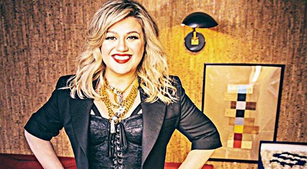 Kelly Clarkson Reveals Hilarious ‘Secret’ To Shedding Pounds