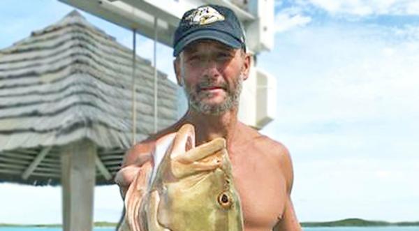 Tim McGraw Shows Off Chiseled Abs In Sizzlin' Shirtless Photo