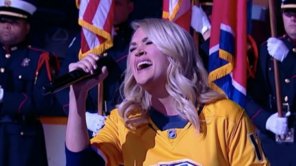 Carrie Underwood Makes Surprise Appearance To Sing National Anthem