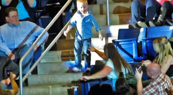 5-Year-Old Stands Up During Country Concert, But When He Steps Into The Aisle? The Crowd LOSES IT!