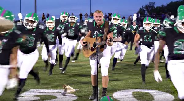 Just Before Game, Football Player Grabs Mic And Drops Jaws