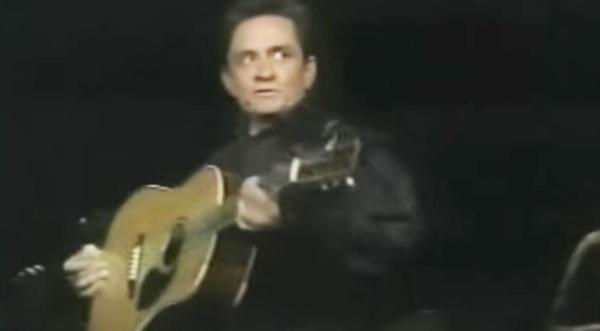 Johnny Cash Performs 'Man In Black' For The Very First Time