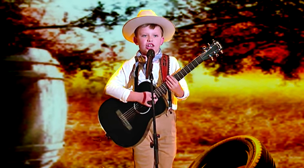 You’ve Got To Hear This 8-Year-Old Unleash Buck Owens’ “Tiger By The Tail”