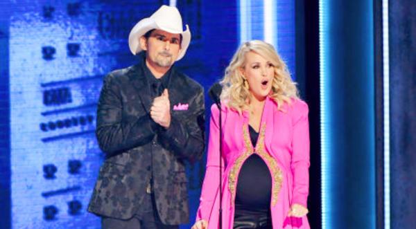 Brad Paisley Gets Carrie Underwood To Spill Baby Gender Secret In CMA Awards Opening
