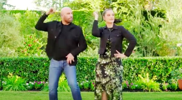 John Travolta & Daughter Do “Hand Jive” Dance From “Grease” In Super Bowl Commercial