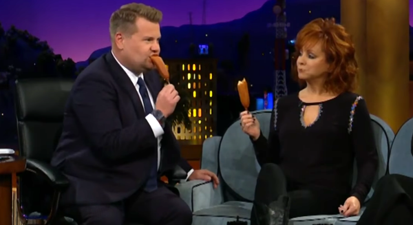 Reba Introduces James Corden To Corn Dogs & His Reaction Is Priceless