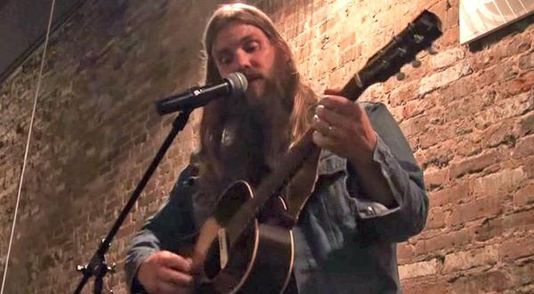 Put Everything On Hold & Listen To Chris Stapleton Sing The #1 Hit He Wrote For Kenny Chesney