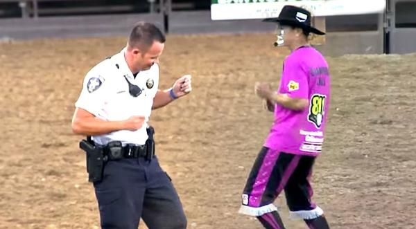 Rodeo Clown Challenges Police Officer To Hysterical Dance-Off