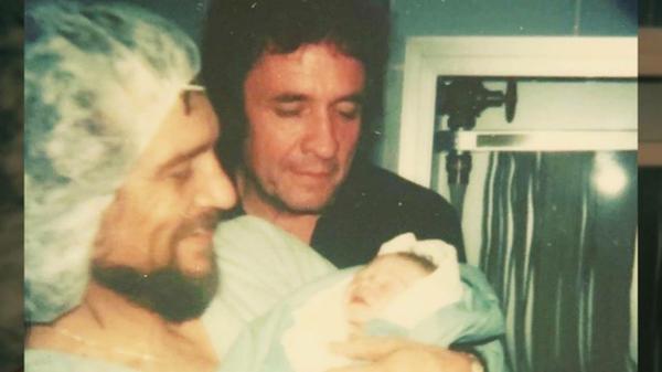 Shooter Jennings Shares Photo Of Waylon & Johnny Cash Holding Him Right After He Was Born