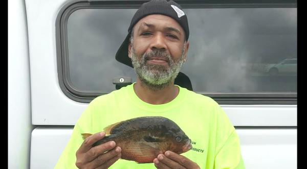 Crazy As It Sounds, This Man Just Broke A 36-Year-Old Fishing Record With A 2-Pound Catch