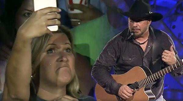 Fan's Sign Prompts Garth Brooks To Halt Concert And Confront Her