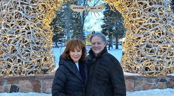 Reba Cozies Up To Boyfriend On Winter Wonderland Vacation