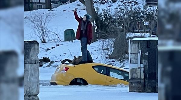 Woman Crashes Car Through Frozen River & Takes Selfie While Sinking
