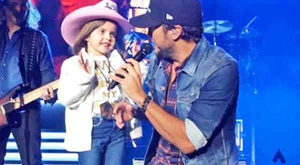 Luke Bryan Invites Shy Little Girl On Stage, But Then She Shocks Everyone