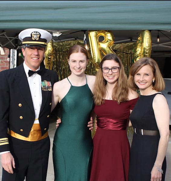 Dr Renee's family with her handsome husband in his Navy uniform