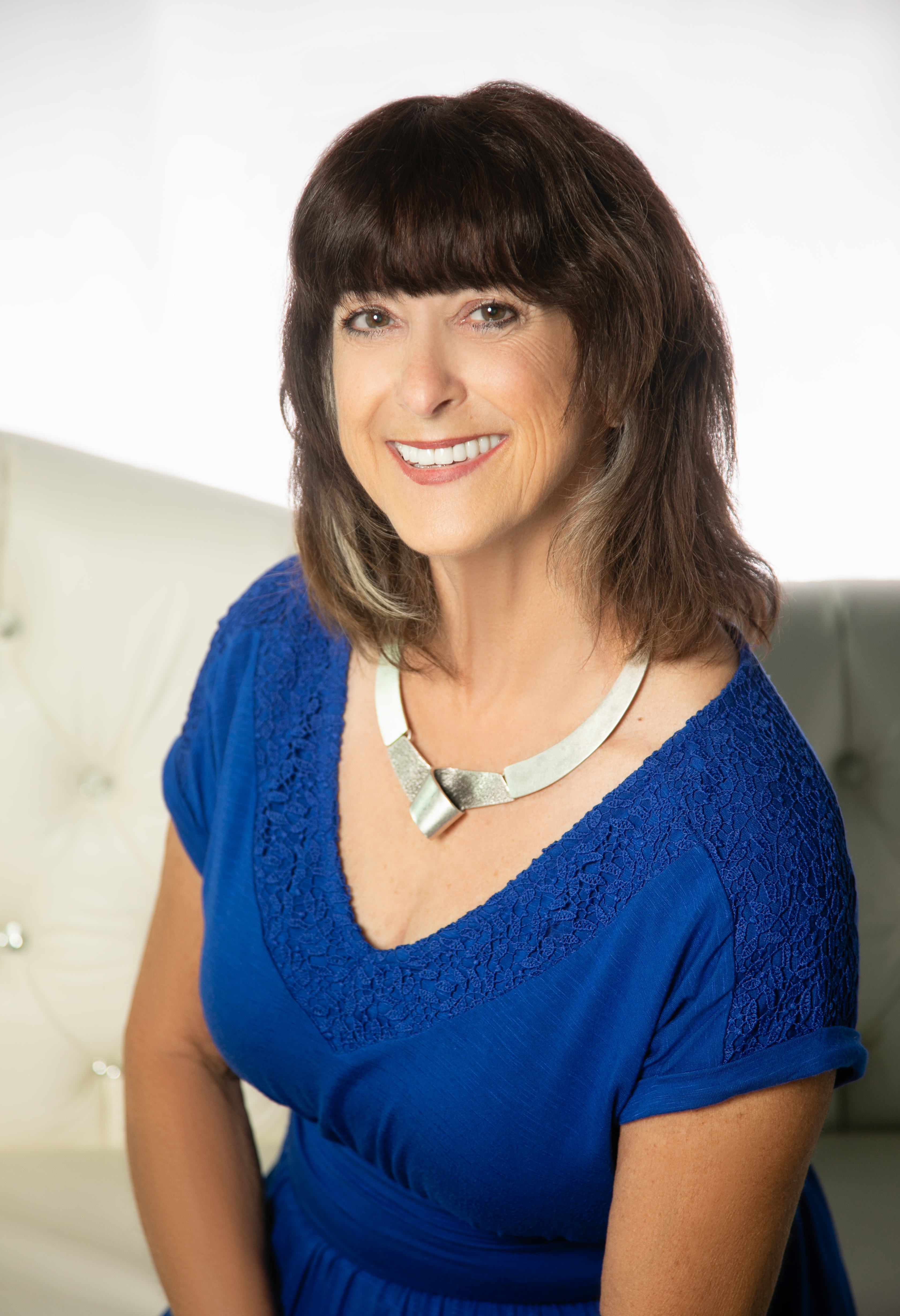 Portrait of money relationship expert Joyce Blue smiling warmly