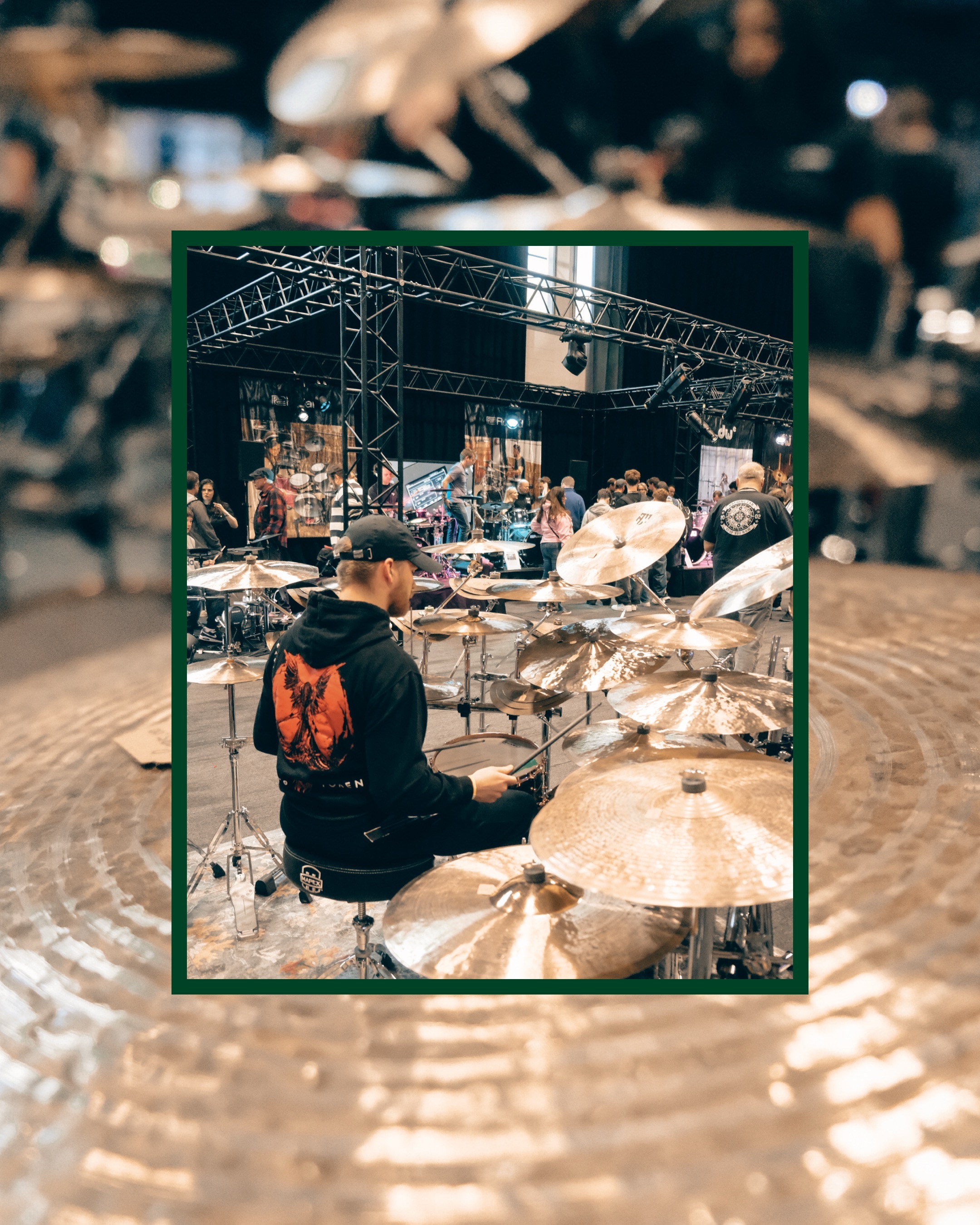 Ryan playing an Ashmore cymbal setup at a UK drum show