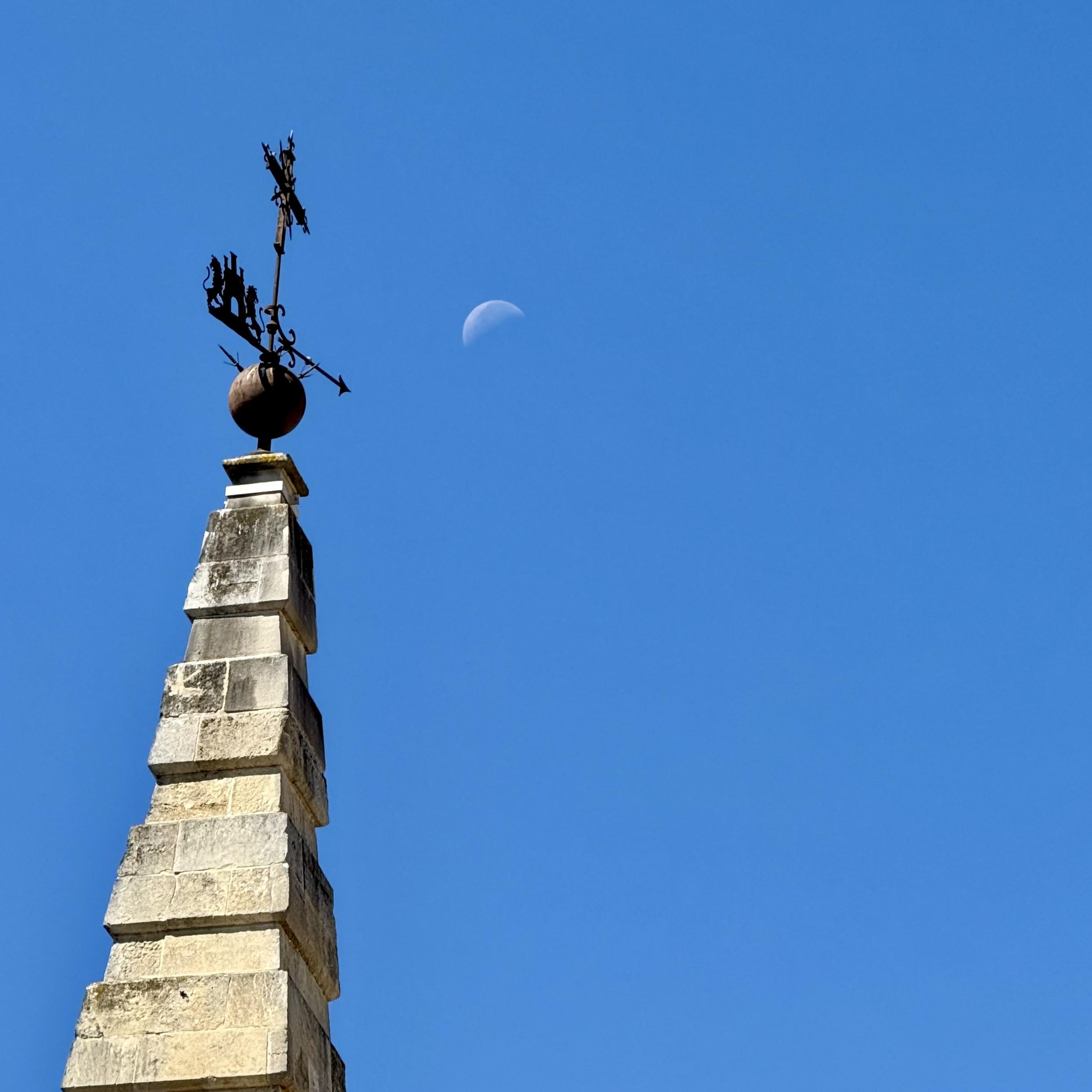 Church spire with moon