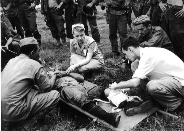 WWII Nurse treating patient 