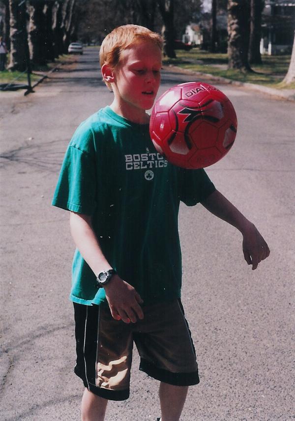 Gabe dribbles soccer ball