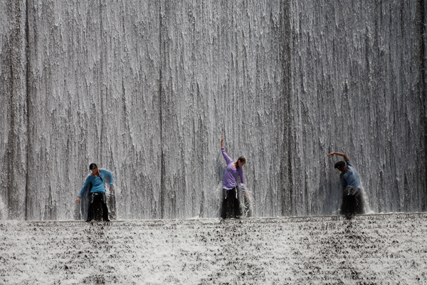 Image - trio of dancers at Houston waterwall